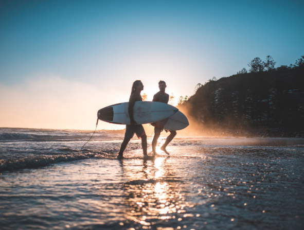 Young men surfing in Australia