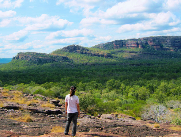 Tourist at Nawurlandja Lookout in Kakadu, Australia