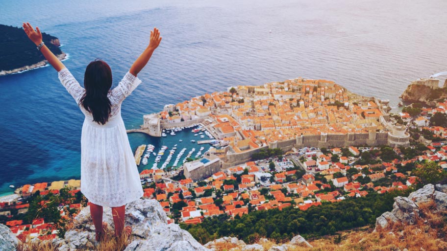 Traveller looking at view of Dubrovnik, Croatia