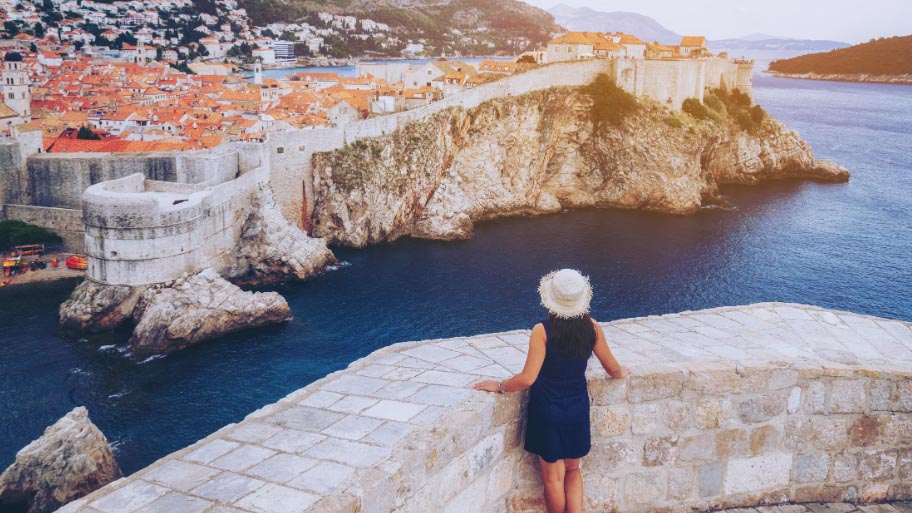 Woman traveller at Dubrovnik Old Town, Croatia