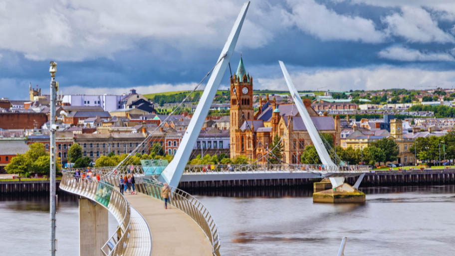 The Peace Bridge and Guildhall in Londonderry / Derry in Northern Ireland