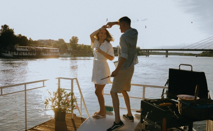 A Romantic Couple Dancing on River Cruise