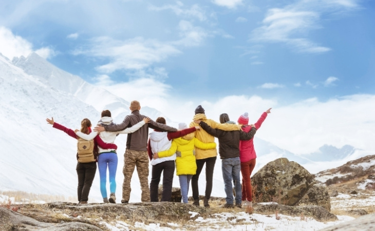 Big group happy friends mountains travel