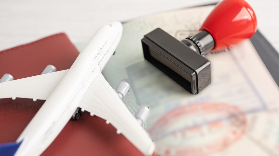 Approved Stamp visa and passport document to immigration at airport in country